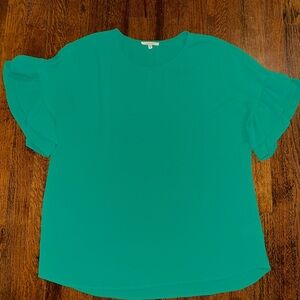 Green blouse with flutter sleeves